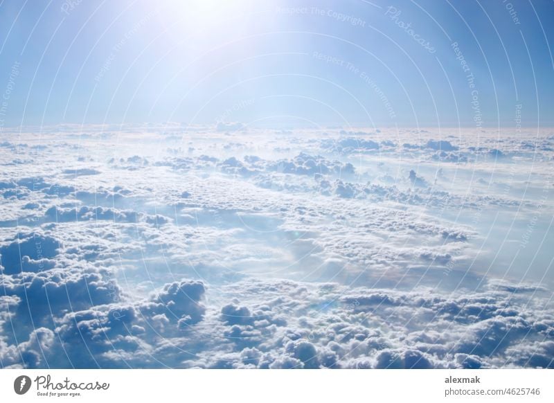 Flight above clouds. Wonderful panorama from the window of the plane with white clouds Sky Heaven abyss Heavenly cloud landscape Weather Landscape Air Wind