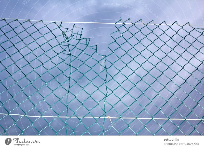 wire mesh fence Wire netting fence Fence Crack & Rip & Tear scam Border Sky cloud Weather Neighbor neighbourhood Sieve mend mended Garden Garden fence