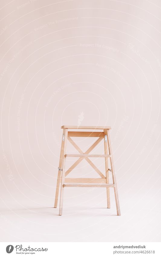 New wooden ladder on the white background. isolated stepladder. Space for text tool tall success object high construction concept building stairs over standing