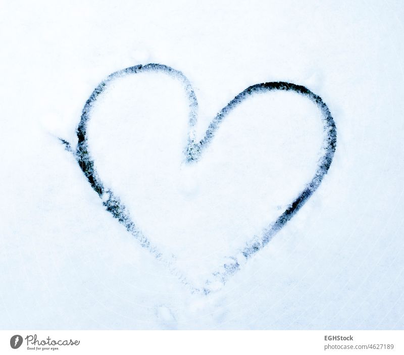 Snow hand drawn shape heart painted in the snow. Winter. Copy space. Love concept valentine winter cold love symbol white nature holiday romance romantic