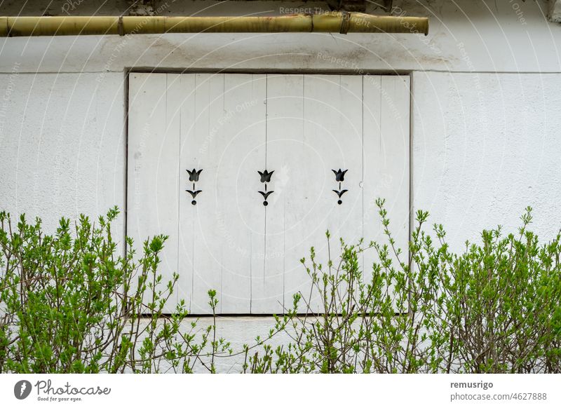 Windows of a rural house. Facade of a house. Exterior view. Rural scene. 2019 Praid Romania abstract ancient apartment architecture background building city