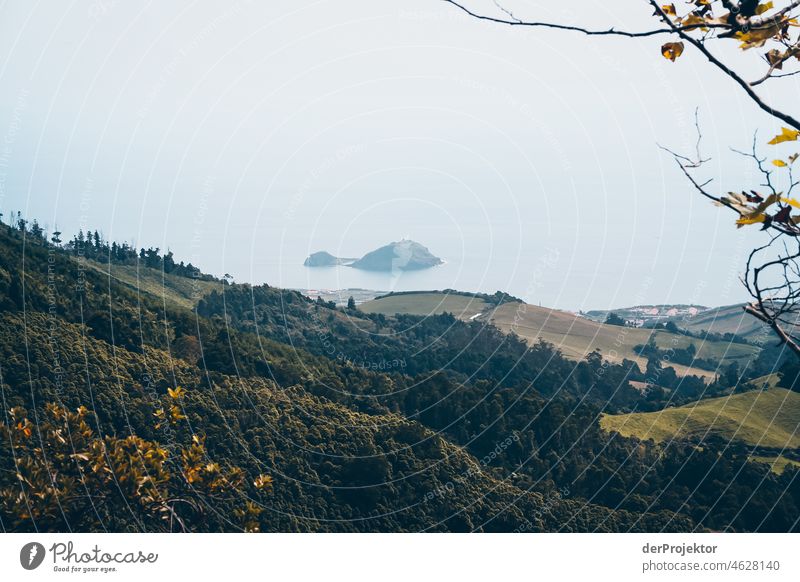 View of offshore island in the Azores Central perspective Deep depth of field Sunlight Reflection Contrast Shadow Copy Space middle Copy Space bottom
