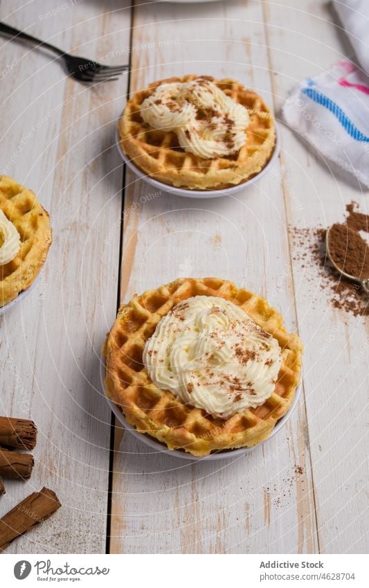 Tasty pumpkin chaffles on table dessert sweet homemade waffle cook culinary frosting cinnamon serve tasty food delicious yummy appetizing kitchen palatable