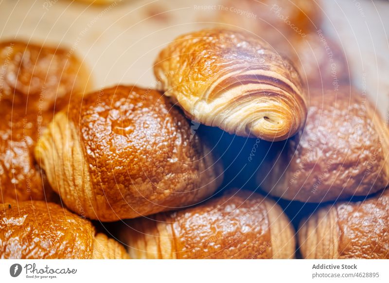 Delicious pain au chocolat in showcase of confectionery pastry sweet chocolatine dessert culinary calorie bakery treat food gastronomy delicious tasty parchment