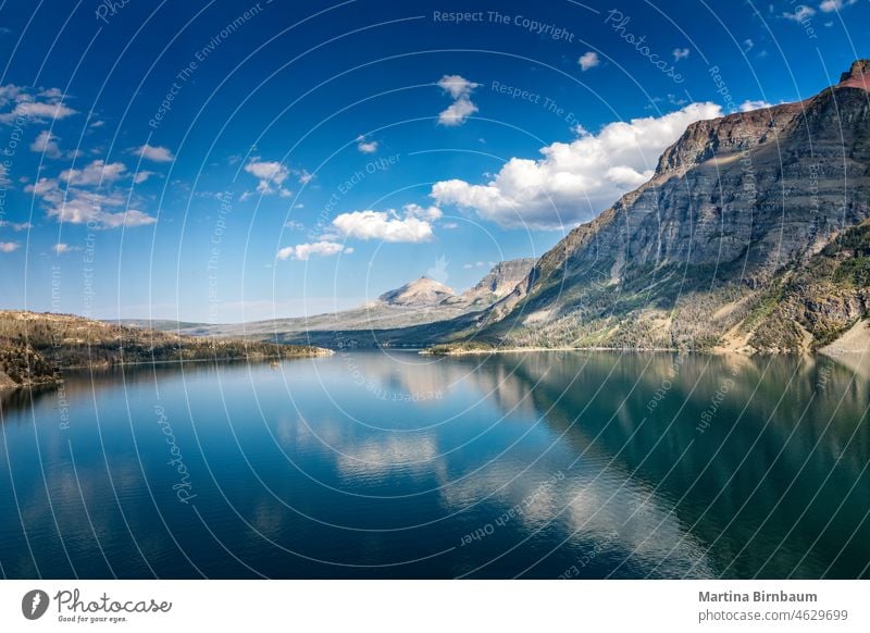 Saint Mary Lake in the Glacier National Park, Montana saint mary lake montana glacier national park montana going to the sun road symmetry symmetrical