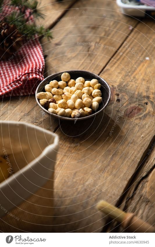 Chickpeas in bowl on wooden table chickpea legume kitchen raw organic healthy natural product nutrition vitamin light ingredient flavor yummy prepare delectable