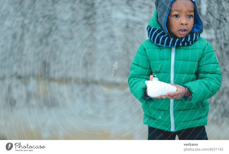 african kid  playing with snow in winter child girl cute happy cold boy leisure young fun person active black childhood outdoors christmas joy illustration