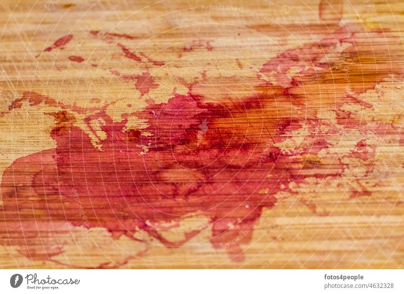 Cutting board with beet stains Tracks blotch blotchy Red focus gradient Wood Play of colours Wooden board colors Chopping board beetroot splash sour Blotches