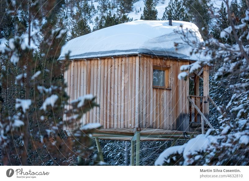 Rustic cabin in the mountains of the Pyrenees in the inerno of 2022 alpine andora andorra architecture canillo cold europe forest grandvalira hermitage hotel