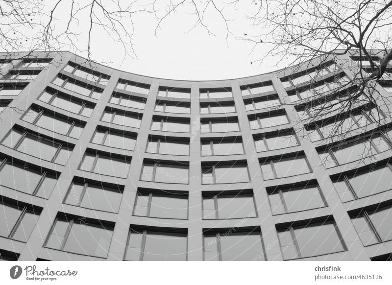 Facade of office building curved black white House (Residential Structure) Building Office Architecture Exterior shot Town Manmade structures Wall (barrier)
