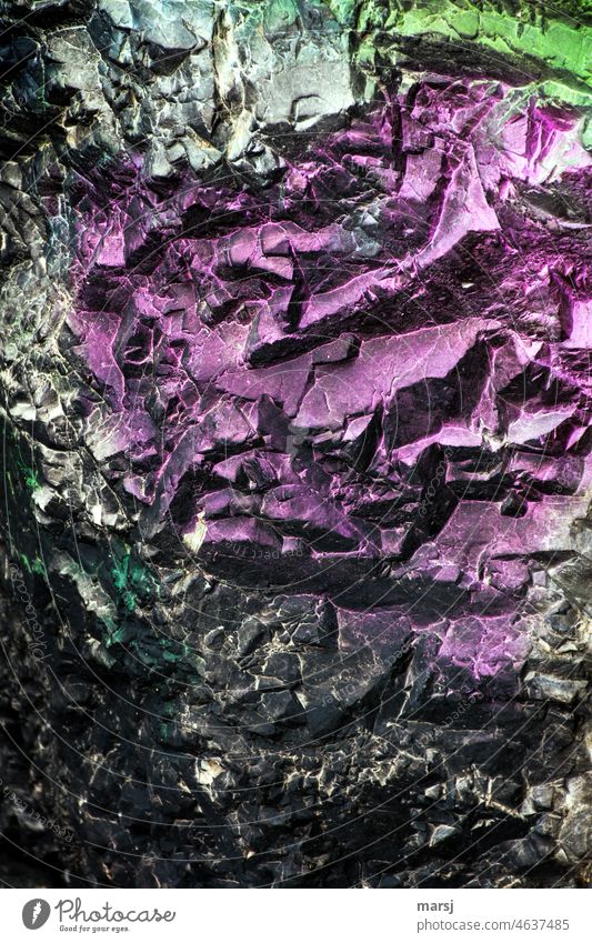 Colorful, metallic-looking structures on a rock. Part of a spray painting, not graffiti Violet Graffiti spraying Sign Art Wall (building) Abstract