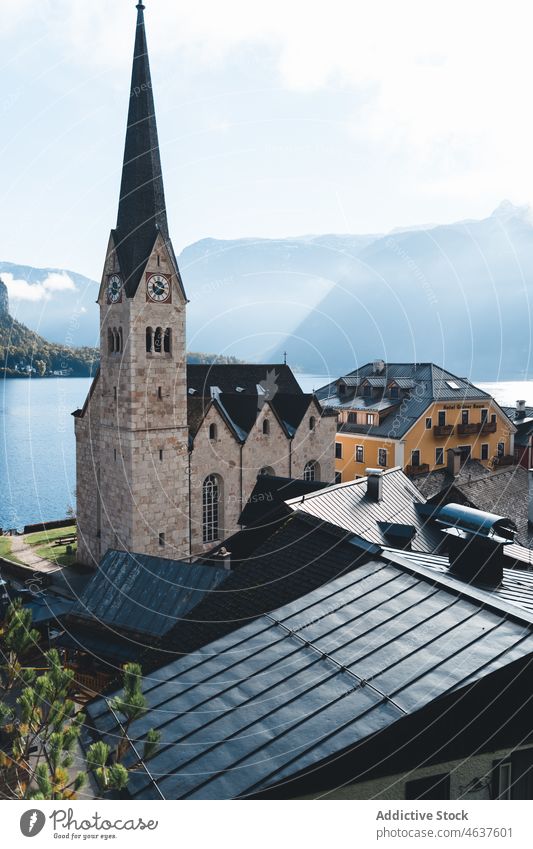 Old stone tower near lake and moutains mountain austria village heritage tourism ancient travel europe nature building architecture old historic church