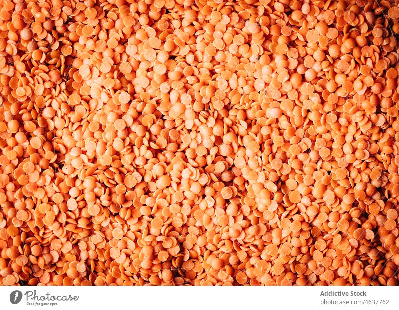 Heap of healthy red lentils background legume culinary organic food raw uncooked seed product fresh natural ingredient cuisine healthy food many light heap pile