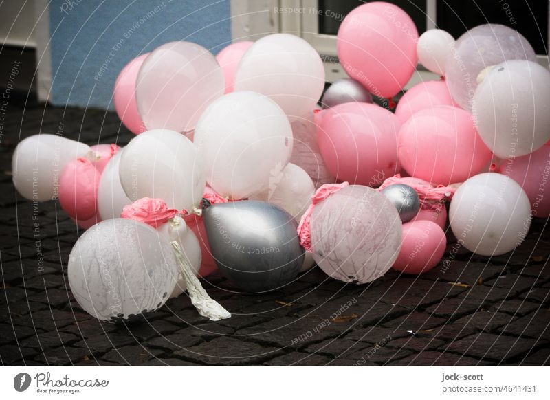 exhausted l balloons after the big celebration Balloon Many colored Decoration Feasts & Celebrations shape Accumulation Inflated Air out Under Pink White