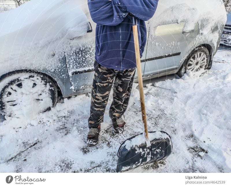 Man shoveling snow Snow shovel snow shovel Shovel Cold Winter Winter maintenance program Snow layer Snowfall Winter's day winter Day White Frost Weather