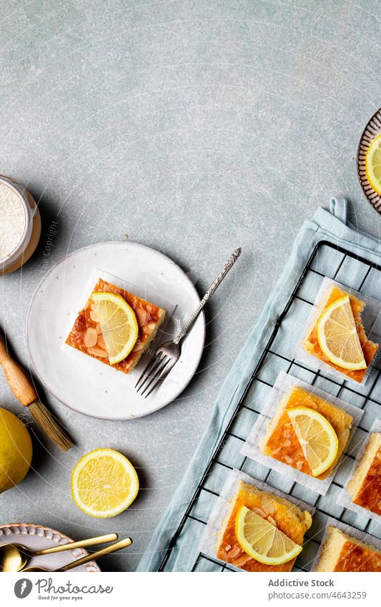 Pieces of tasty lemon cake slice homemade rack baked dessert sweet portion citrus treat delicious plate culinary yummy fruit sour kitchen table cuisine fresh