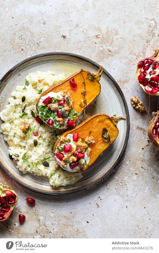 Rice with roasted pumpkins and pomegranates rice meal vegetable homemade food culinary healthy food tasty delicious seed yummy cuisine nutrition light