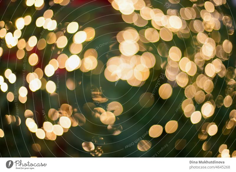 Defocused gold lights bokeh background. Christmas lights bokeh texture. glowing shiny abstract defocused night illuminated glamour luxury no people sparkle