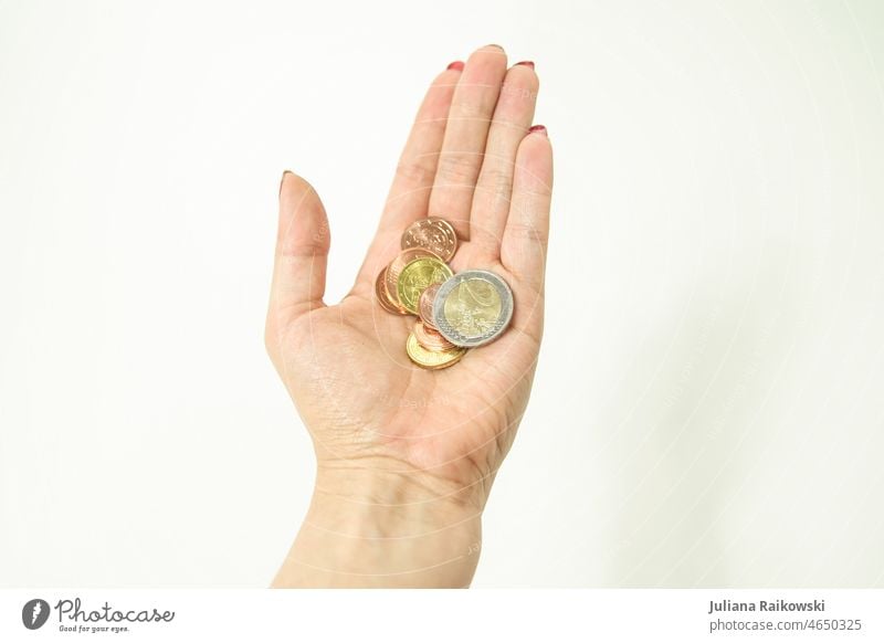 Hand with money coins Money Euro Coin Save Loose change Financial Industry Paying Luxury finance Income Shopping Economy Business savings payment investment
