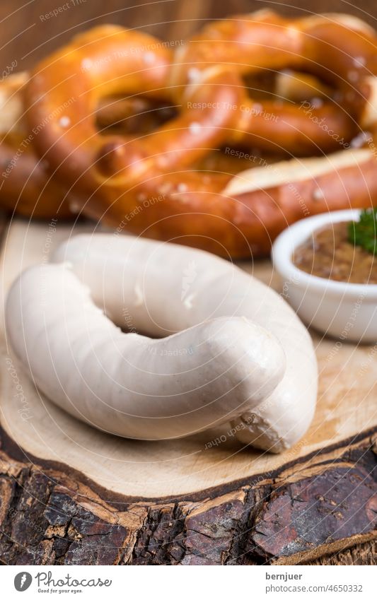Pair of Bavarian veal sausages White sausages Veal sausage Wood Pretzel pretzel Couple snack two plank cute Breakfast Munich Mustard Germany Lunch Hot hearty