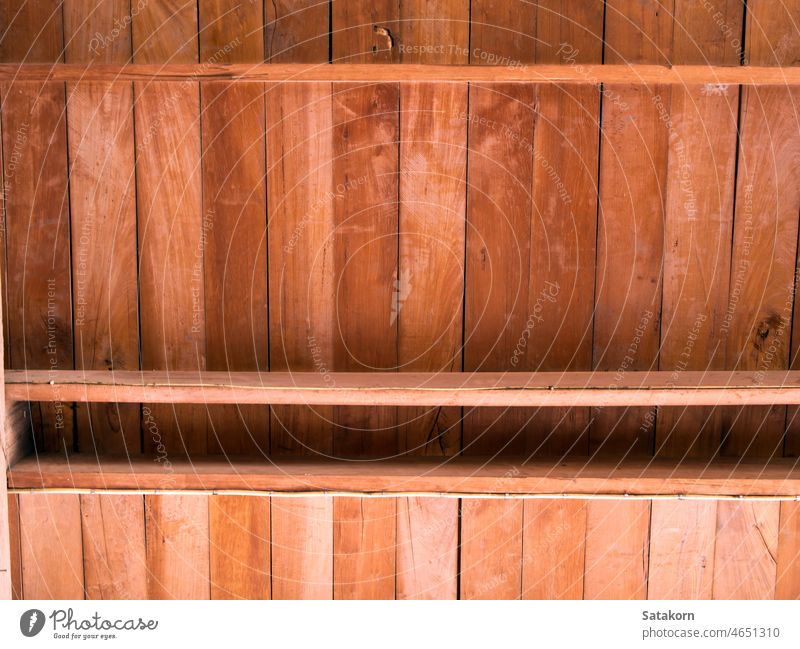 Under Second wooden floor ceiling background texture natural brown timber battens pattern close up yellow architecture detail construction structure surface