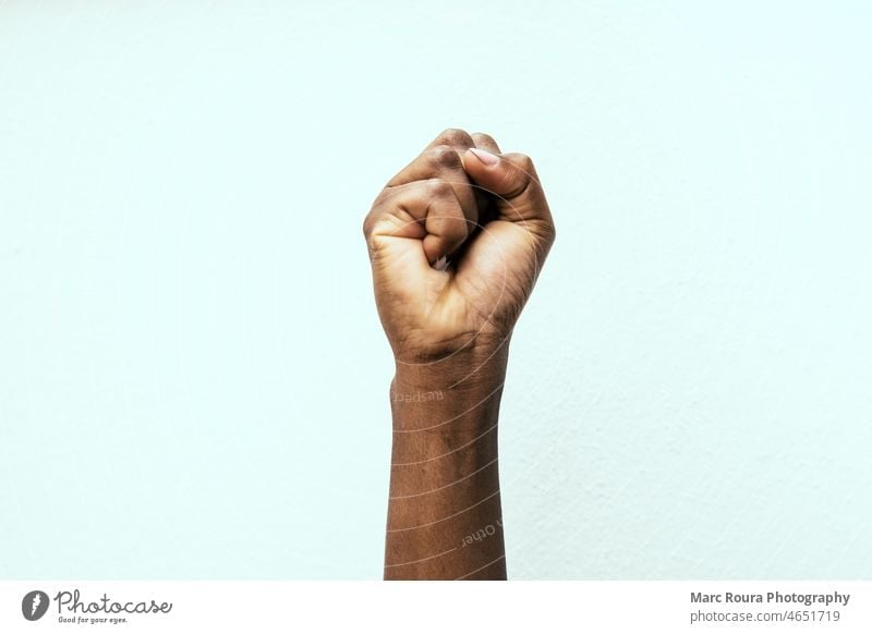 black fist in the air as a sign of power africa american african angry arm background black lives matters fist black matters body business campaign caucasian