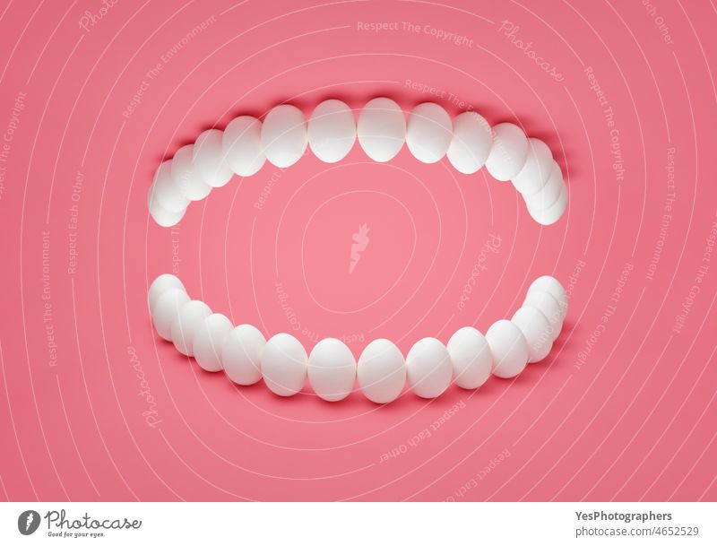 Human denture concept with chicken eggs. Healthy teeth presentation. abstract anatomy artificial background beautiful bleaching calcium care clean clinic
