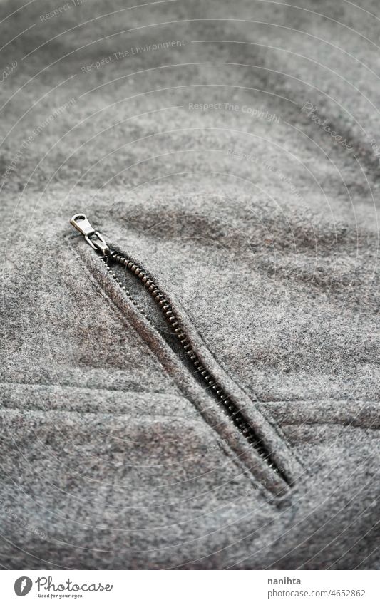 Detail of a classic cloth coat winter trendy fashion part detail expensive quality clothes grey gray texture abstract textile soft warm retro vintage no people
