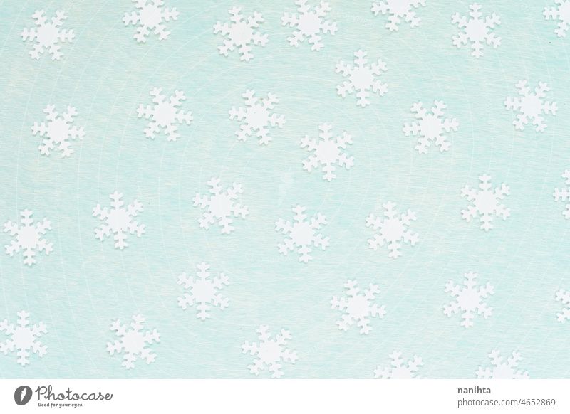 White snowflakes over a turquoise background weather cold winter kawaii pattern glitter white pastel tone subdued color blue temperature bad weather duotone