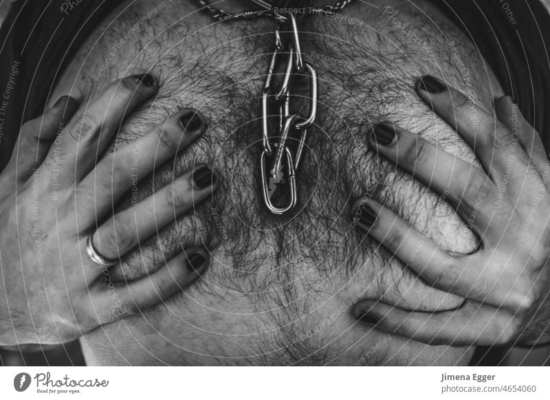 hairy man chest with chain and hands with painted fingernails Man Chest man's breast Naked Upper body Human being Body Adults Varnished Chain link chain