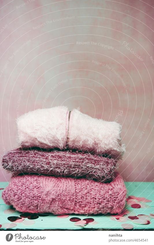 Beautiful woolen sweaters in pink tones texture knitting textile craft fashion clothes clothing soft retro vintage woman girl femininity childhood abstract