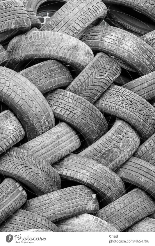 Waste tires on stockpile Tire Car tire scrap tyres Trash Recycling Tire tread legacy Recyclable material Profile structure Black & white photo black-white