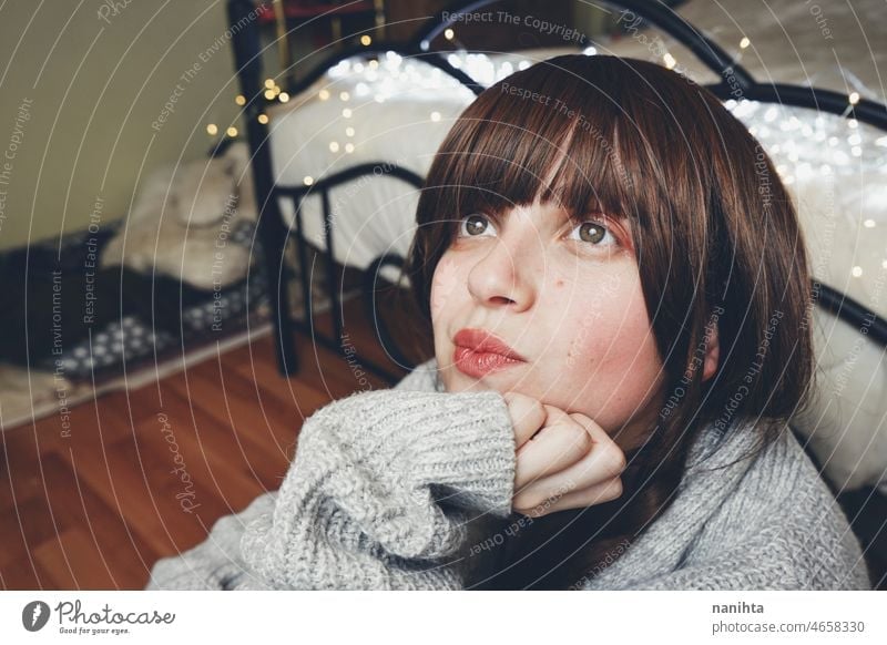 Portrait of a young woman at home in autumn hope wish hopeful dream dreamy youth mood moody emotions feelings day daydreamer daydreaming lights bokeh love