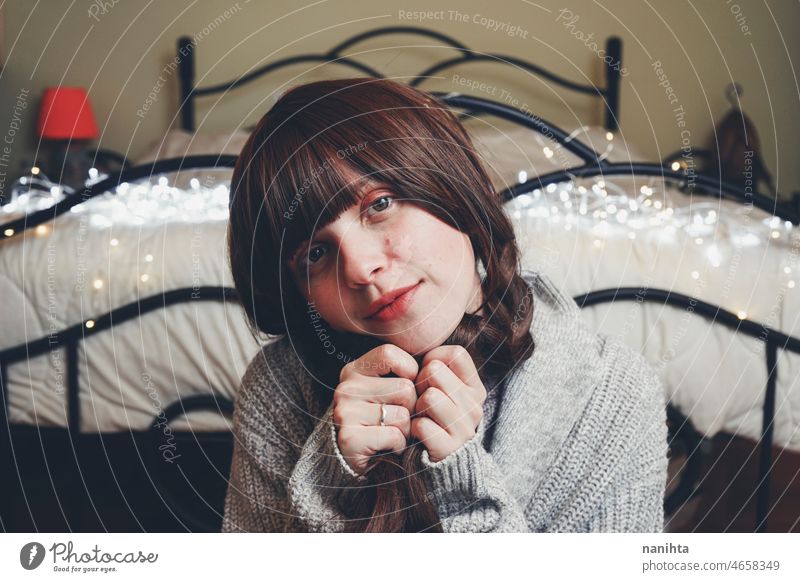 Portrait of a young woman at home in autumn hope wish hopeful dream dreamy youth mood moody emotions feelings day daydreamer daydreaming lights bokeh love