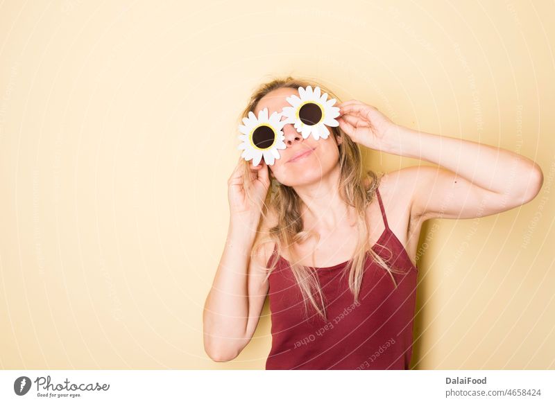 woman with daisy glasses yellow background summer spring smile happy