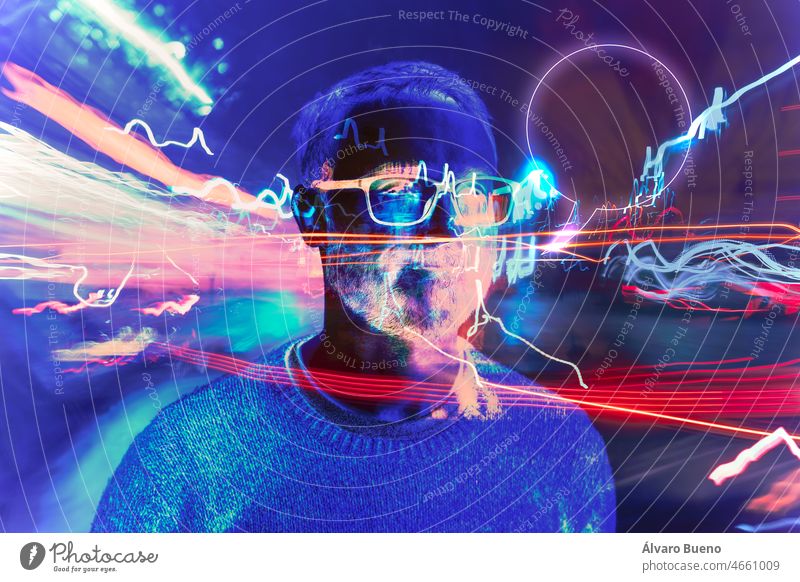A man in the metaverse, surrounded by lights and futuristic effects, forming an artistic representation of the fusion between virtual reality and reality person