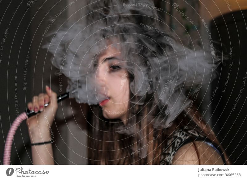 Woman smokes Shisha Adults Cool (slang) Inhale Smoky Addictive behavior Vice Addiction Nicotine Health hazard Harmful to health Unhealthy Smoking Smoke