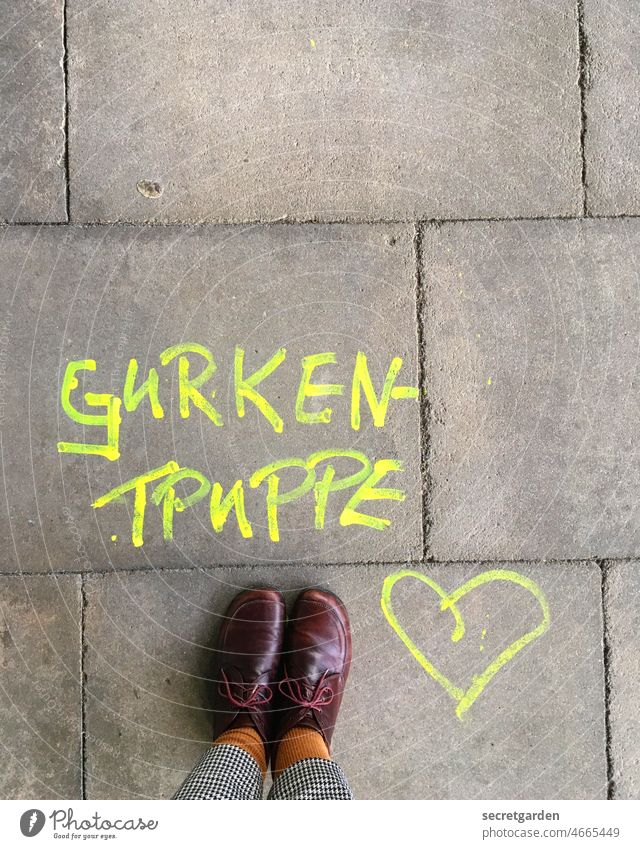 A heart for cucumber troops Cucumber troupe flop feet floor on the ground Heart Graffiti Typography Grid Stone slab walkway slabs off Pedestrian Street Sidewalk