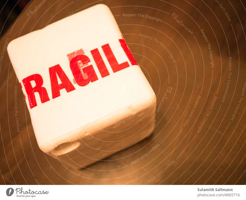 Styrofoam package with red inscription "FRAGILE". fragile parcels writing signs symbol typo white-red Fragile Two-tone Letters (alphabet) Word Term watch