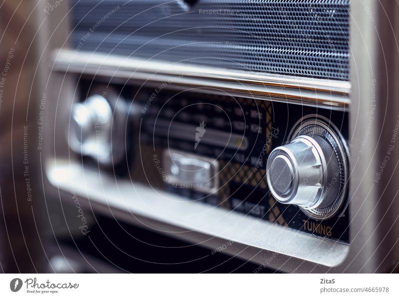 Closeup detail of a vintage style radio closeup old retro equipment music frequency technology antique communication sound wave