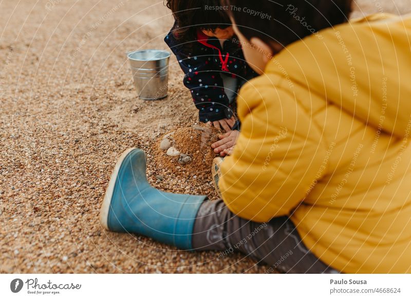 Brother and sister playing with sand Brothers and sisters Together two people Child childhood Authentic Life Family & Relations Colour photo Happiness Infancy