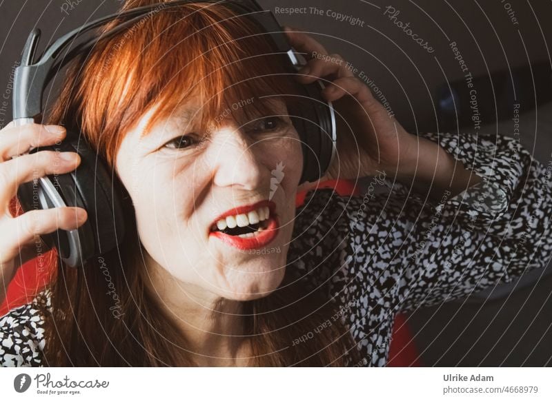 Vocal sample| woman with analog headphones, singing happily to herself Headphones Analog Woman red lips Sing Face portrait Adults Radio Listen to music