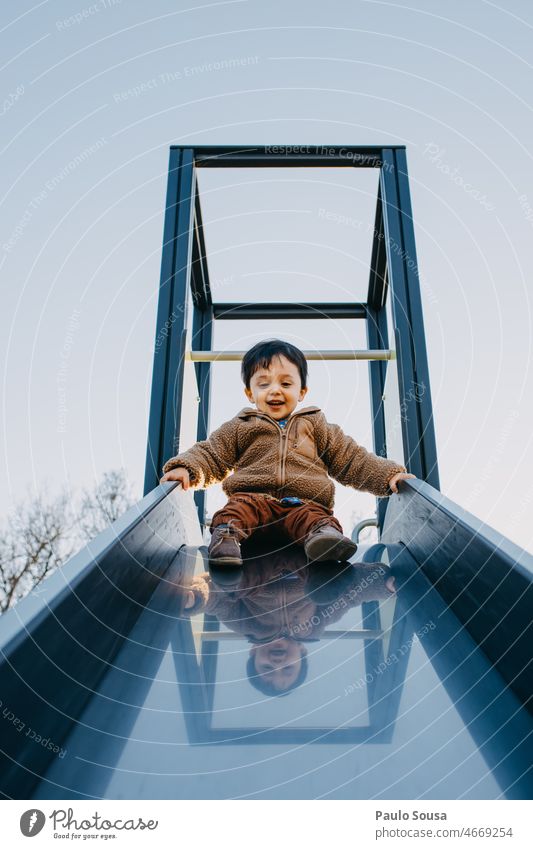 Child playing on playground Boy (child) 1 - 3 years Caucasian Playground Leisure and hobbies Happy Joy Day Human being Infancy Toddler Exterior shot