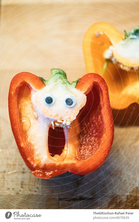 Pepperoni with wiggle eyes Chili Eating Yellow Food Vegetable Cooking Tasty Healthy Meal wobbly eyes Face Funny facial expression Colour photo Amazed Red