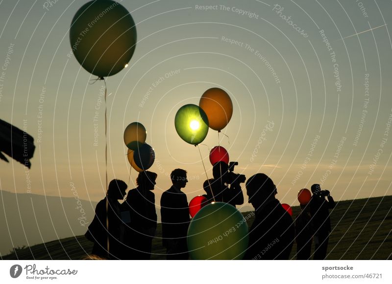Sun in balloon Human being Visual spectacle Silhouette Balloon