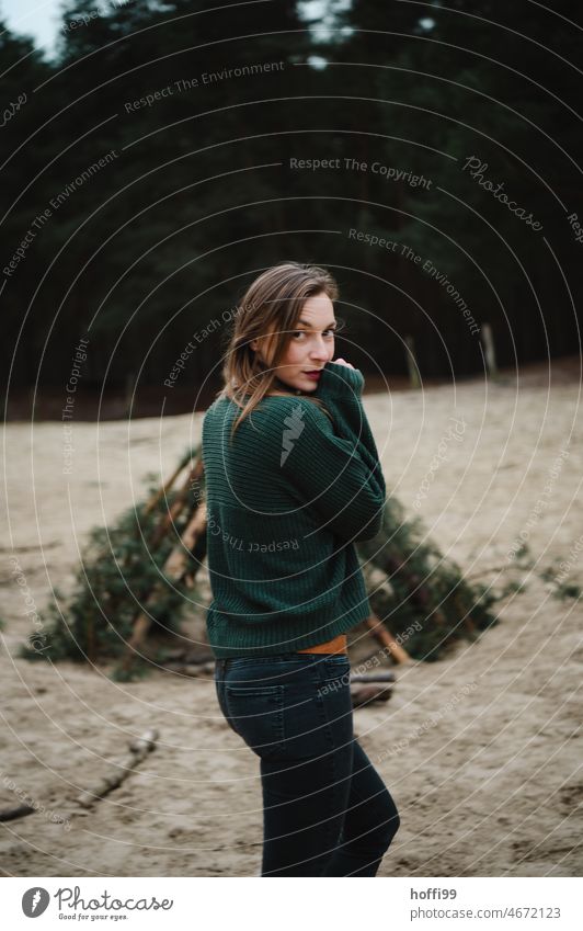 a woman looks confidently into the camera Looking into the camera portrait Pensive Eyes Experiencing nature Actress Tree trunk Beauty Photography Human being