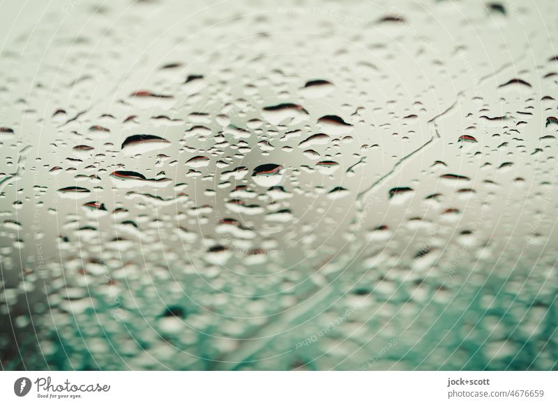 Raindrops on the windshield Pane raindrops Wet Background picture Detail Abstract blurriness Drops of water hazy Windscreen Close-up Macro (Extreme close-up)