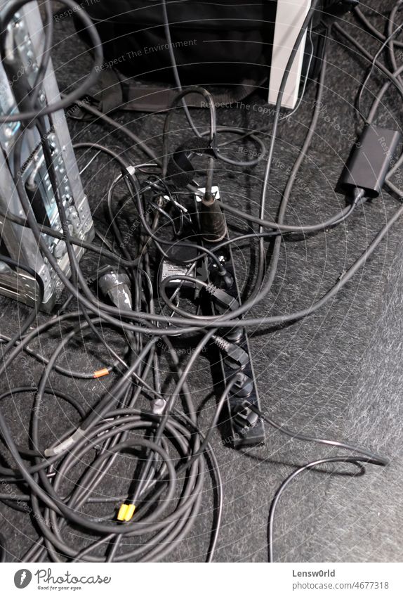 Chaotic electric cables on the ground black chaos chaotic messy power power cable technology untidy
