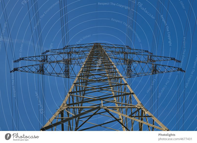 High voltage pylon from frog perspective mast High voltage power line Energy industry Cable Electricity pylon Sky Technology Transmission lines