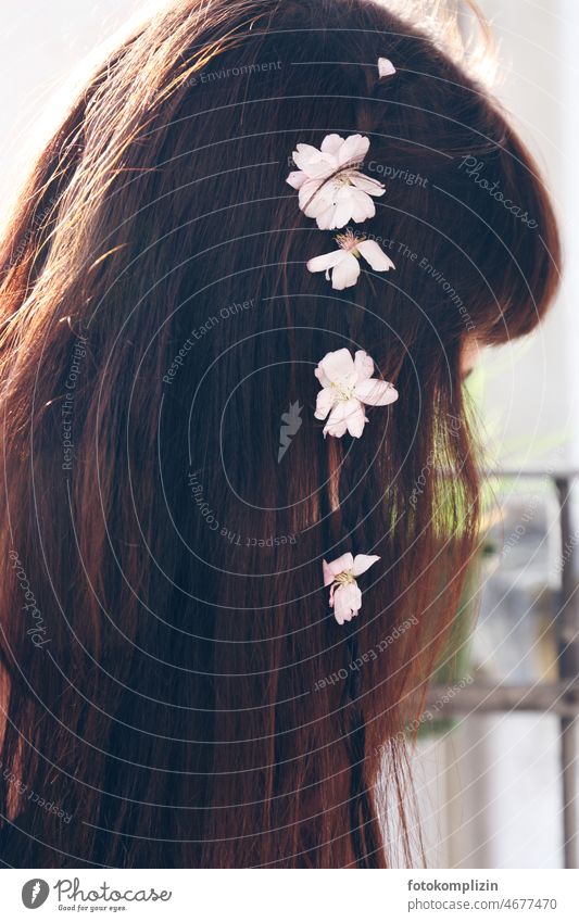 Flowers in long hair of girl Hair and hairstyles blossoms Feminine pretty Young woman feminine Woman Girl romantic Romance Hippie flower girl Hair accessories